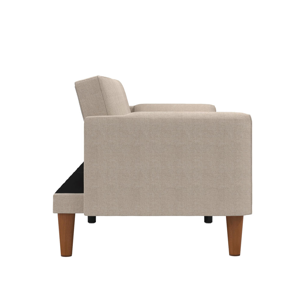 The Markham Futon features a minimalist Scandinavian design with wooden legs and square armrests. Its slightly reclined backrest provides a comfortable seating angle, combining style and firm cushioning against a white background.