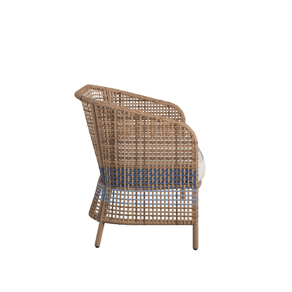 Side view of a French blue wicker chair from the Ava 4-Piece Wicker Conversation Set, showcasing a woven design with beige and blue striped cushion, natural wood finish, and sloped backrest, ideal for conversation settings.