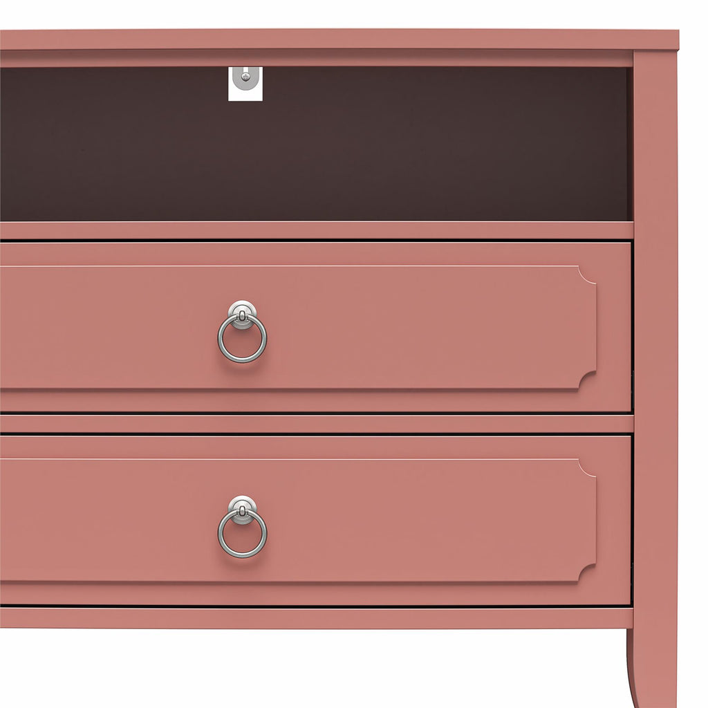 Close-up of a coral-colored Her Majesty 2 Drawer Nightstand, featuring decorative silver ring handles and an open shelf on top. Its elegant style showcases clean lines and subtle detailing on the drawer fronts.